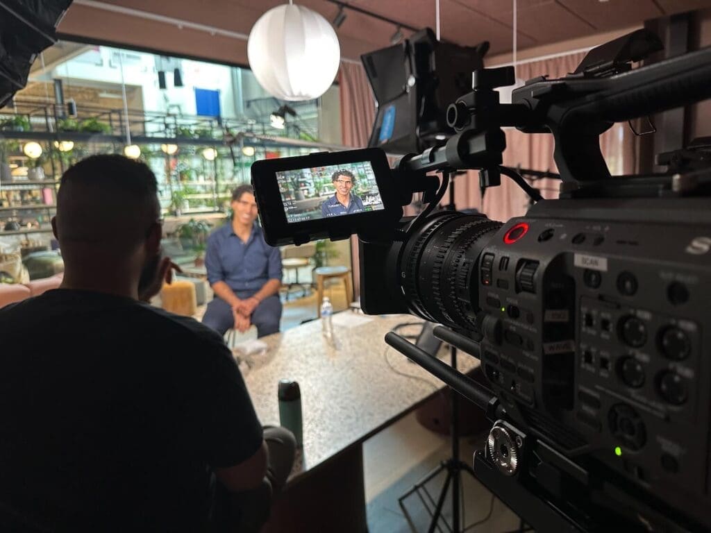 Corporate Interview set-up shwoing subject a good distance from background